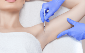 woman getting Hyperhidrosis injections in Sussex skin clinic